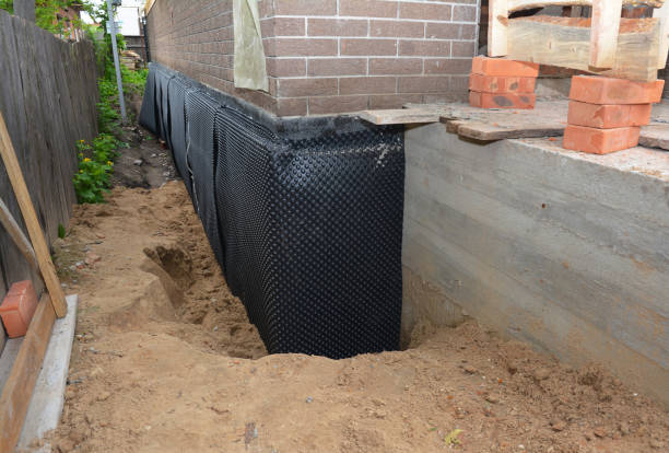 SJ Waterproofing Pros technician performing targeted Waterproofing assessment in Farner, TN